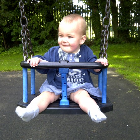 Boo and the colour coordinated swing!
