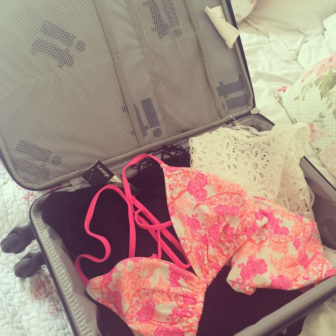 A suitcase filled with George Swimwear goodies!