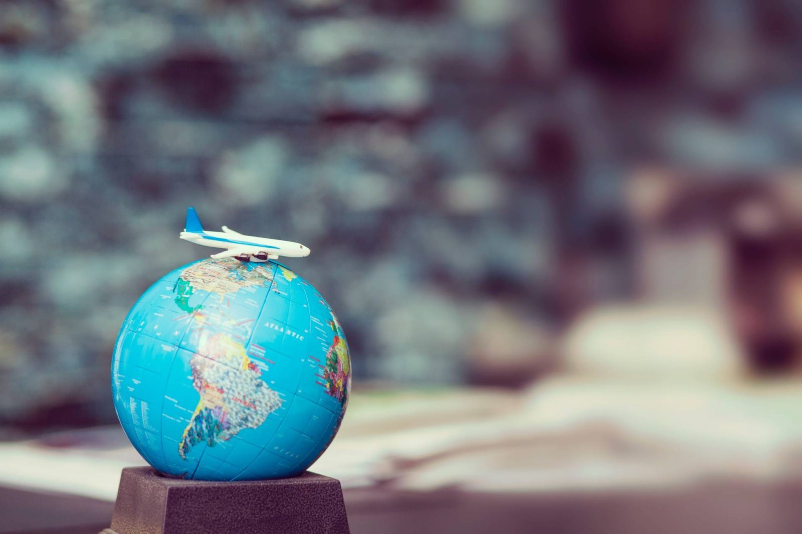 selective focus photo of desk globe