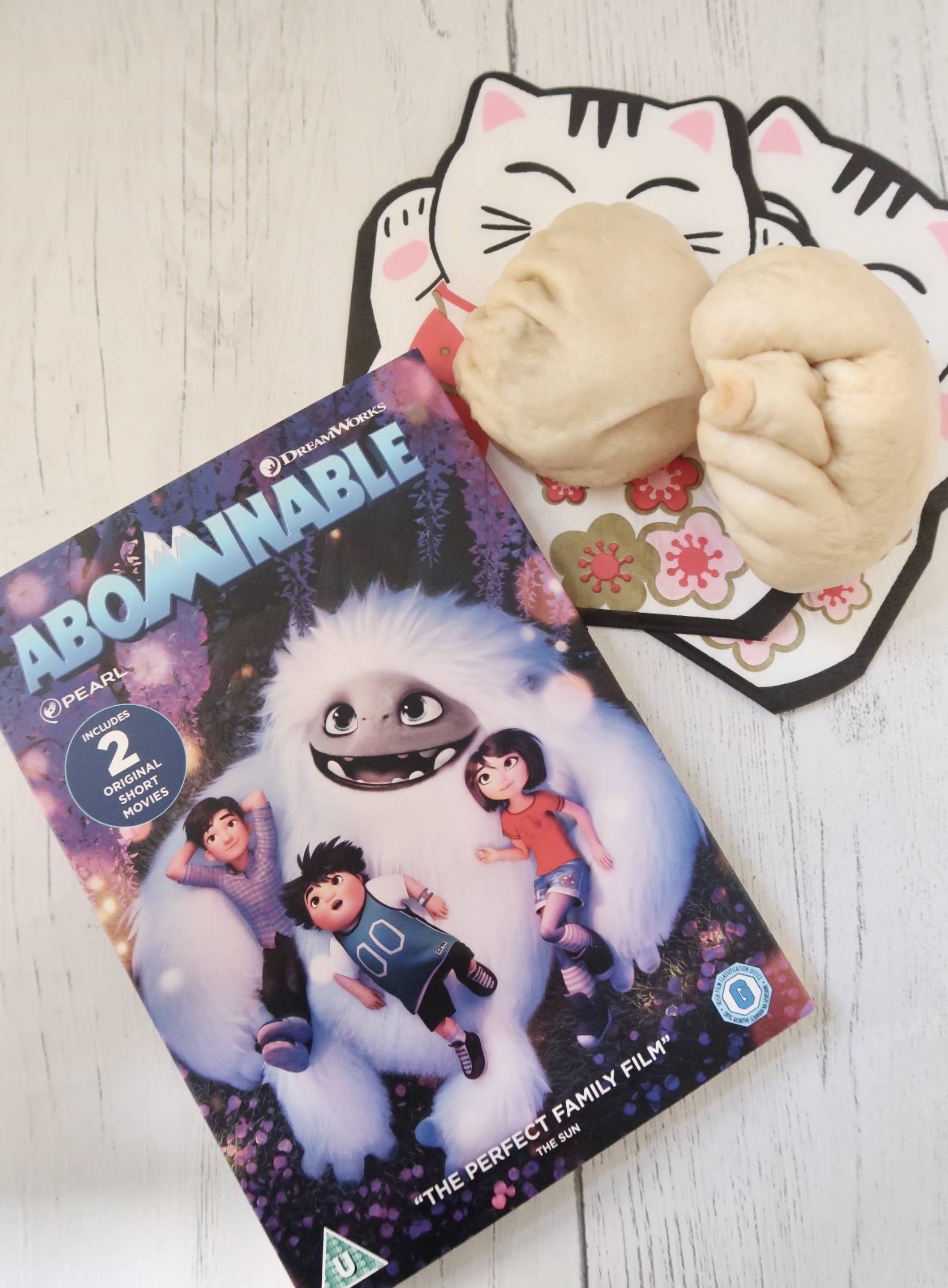 Abominable dvd and bao buns flat flay