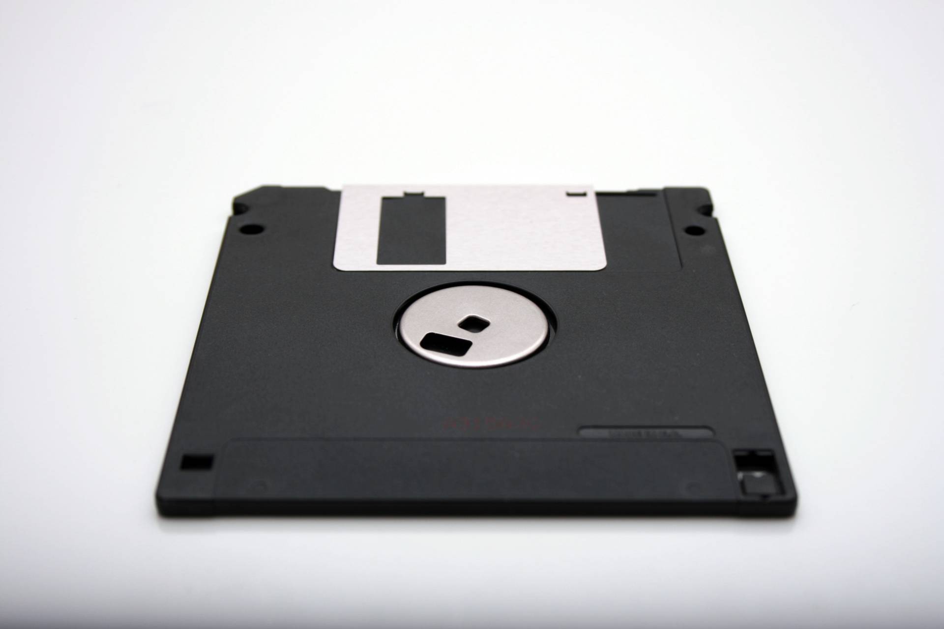 Black floppy-disk on white backfground