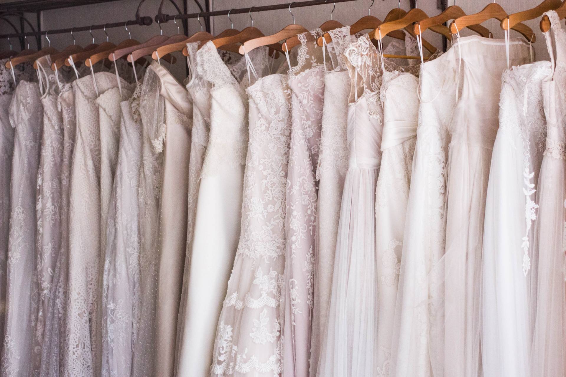 Row on wedding dresses on rail