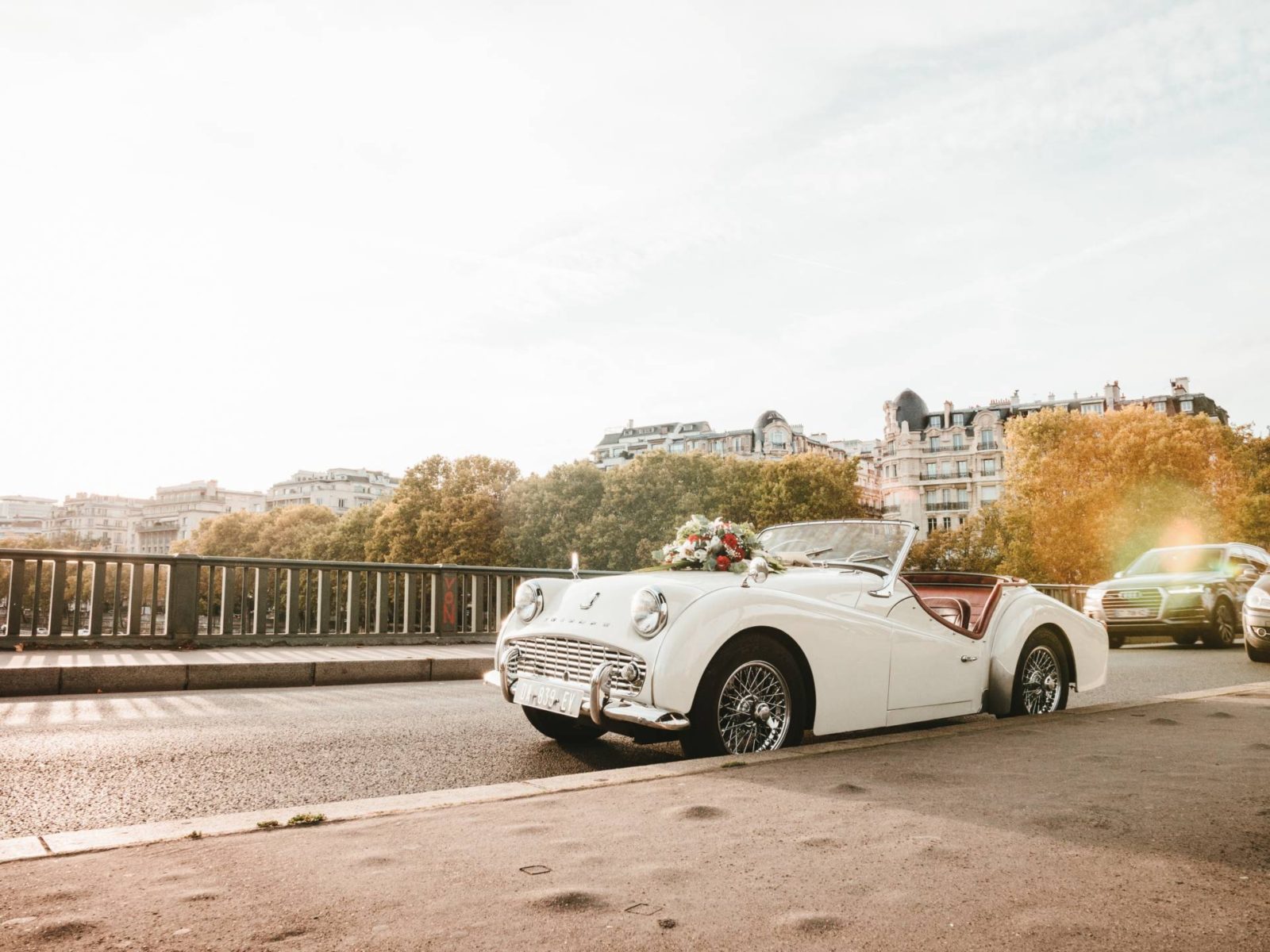 Vintage cream open top car on bridge