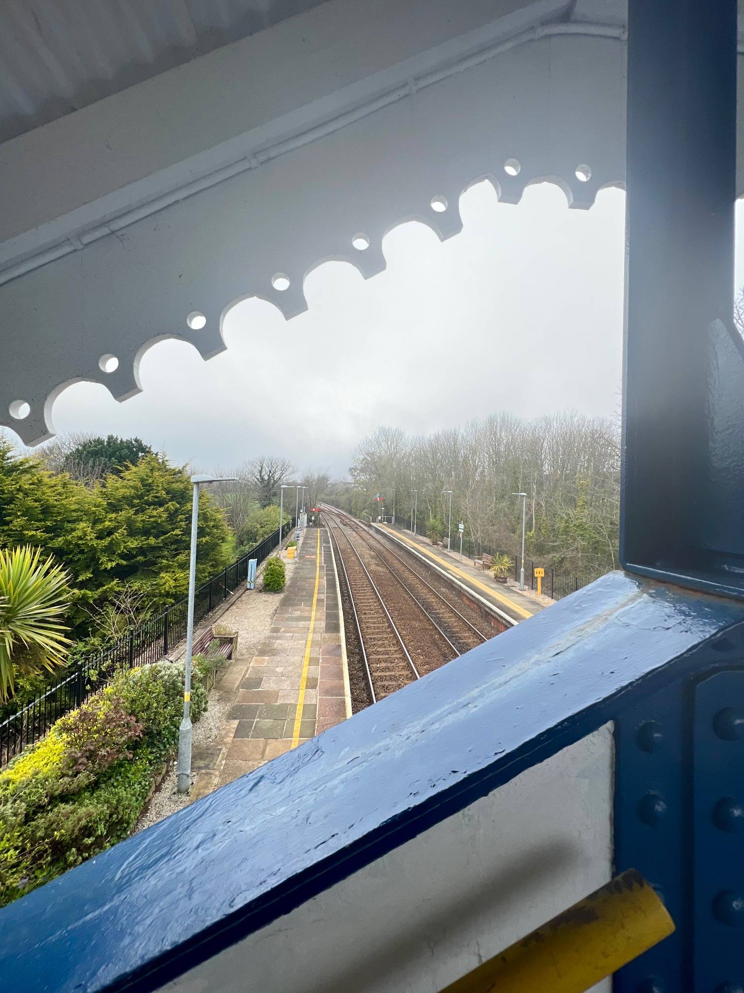 railway track from a wooden platform bridge